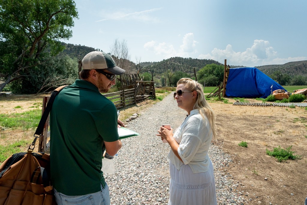 Extension Agent works with local rancher in Garfield County.