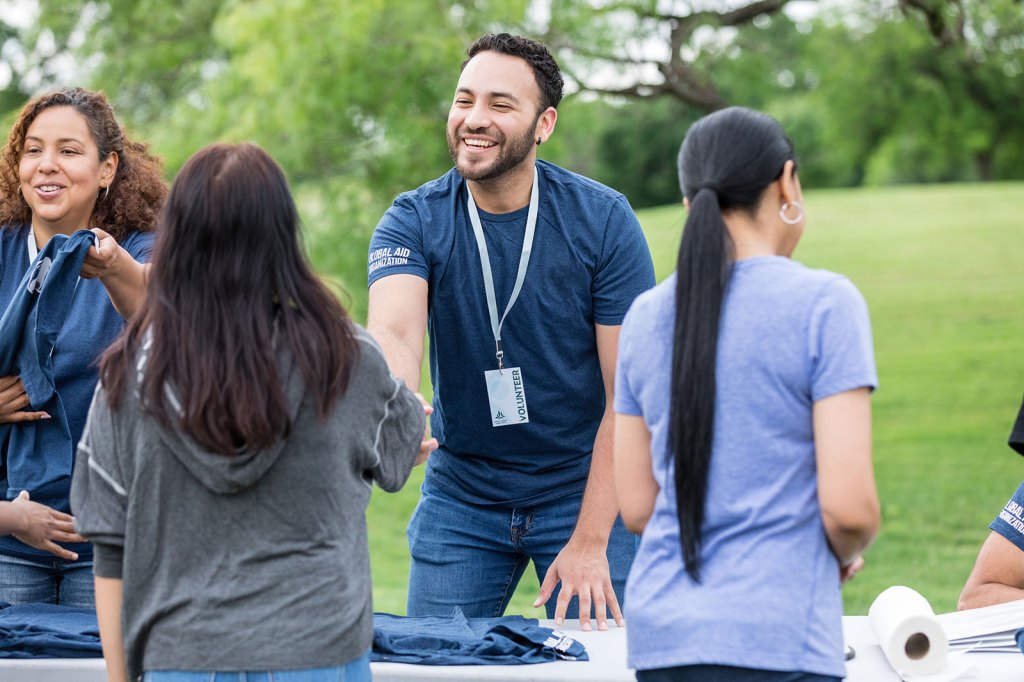 A group of people volunteer to help the community